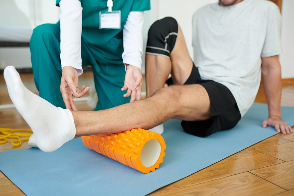 Patient,Or,Rehabilitation,Center,Using,Myofascial,Roll,To,Release,Muscle